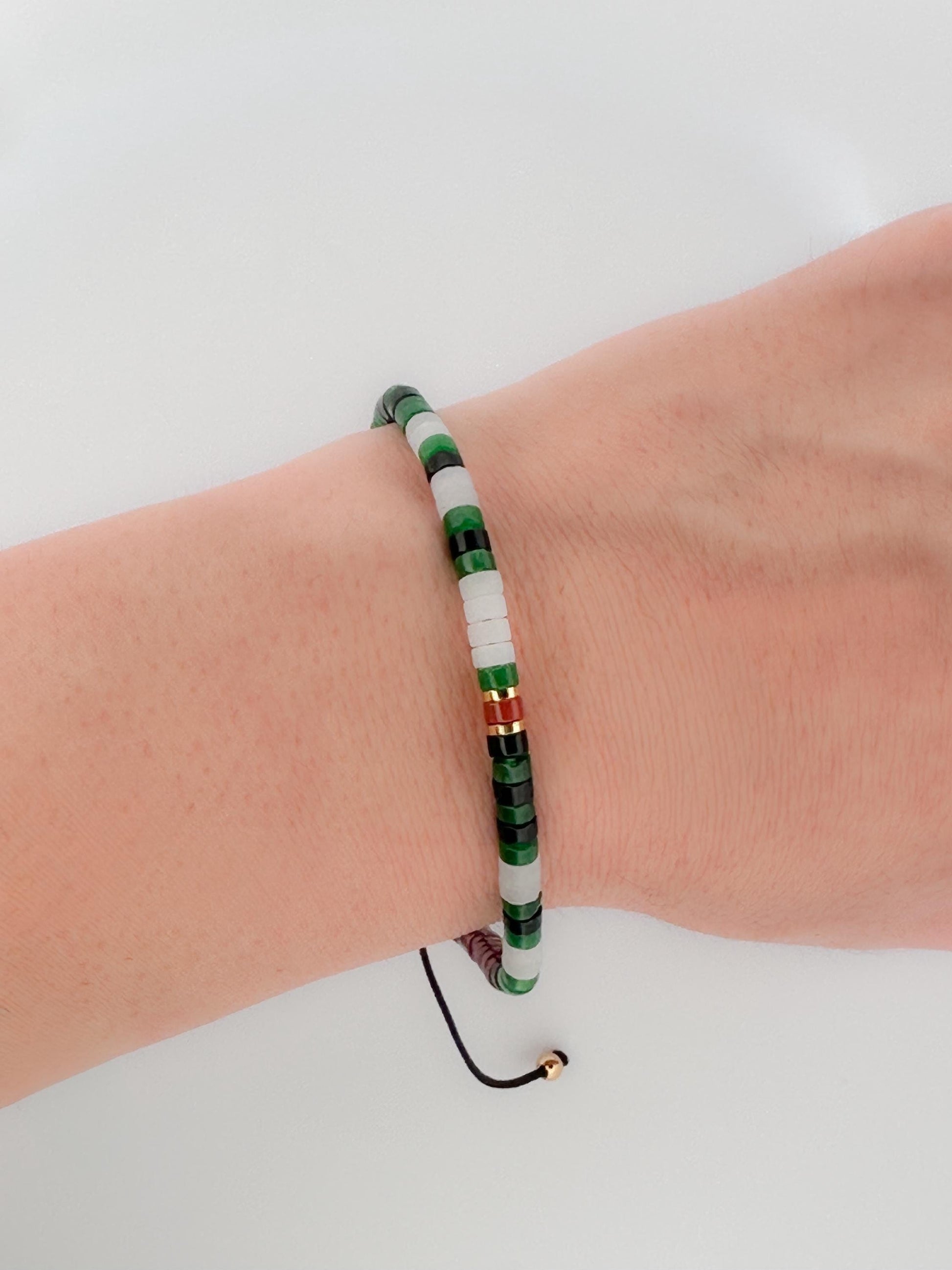 The Morse Jade Bracelet - “Free Palestine” in Palestinian Flag Colors. 100% Proceeds go to Heal Palestine Org.